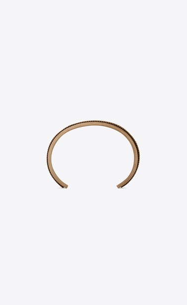 Folk cuff bracelet in metal with two twists